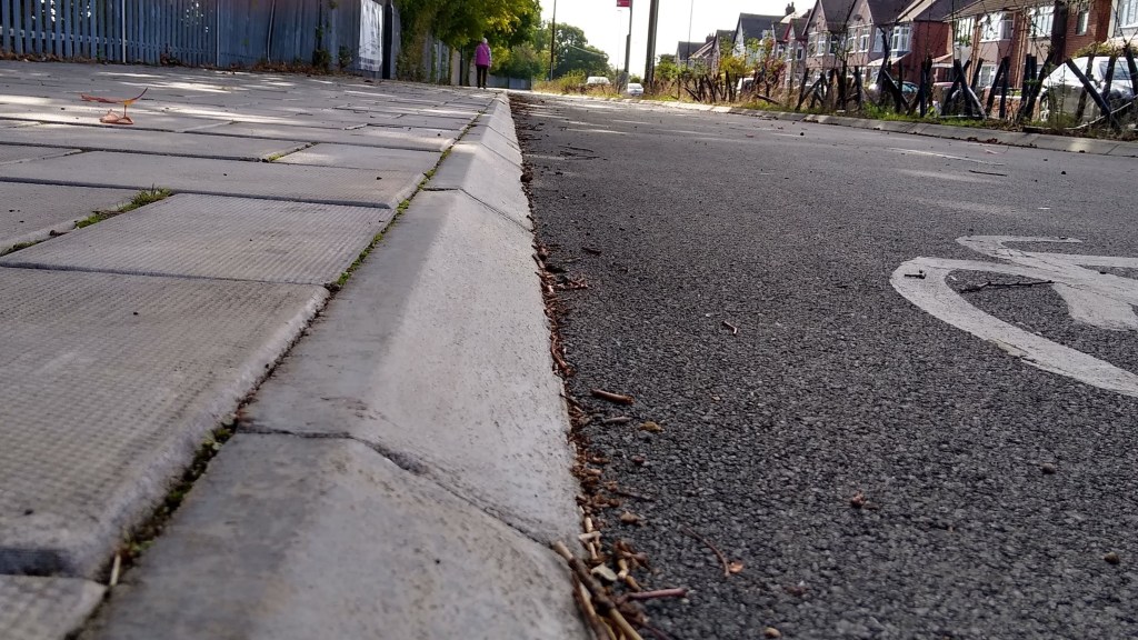 A close up of a 30 degree sloped kerb.